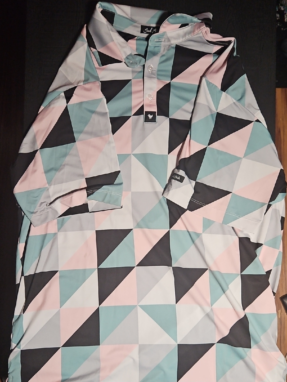 Bad Birdie Geometric Polo in Pastel Pink, Mint, Black, and White